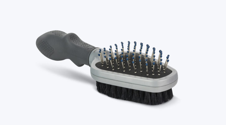 Dwustronna szczotka dla psa i kota z metalowymi włosiem z jednej strony i grubym włosiem z drugiej strony z grubą rączką ułatwiającą trzymanie