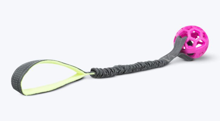 Szarpak dla psa bungee z piłką Trixie różowy 48 cm.