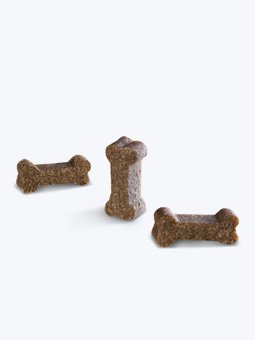 36. Trzy kosteczki chrupki dla psa