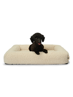 Zdjęcie przedstawia legowisko BALI WOOLY z widoku z góry, pokazując jego proporcje i kształt. Widać podwyższone boki oraz szeroką powierzchnię do leżenia, co zapewnia psu wygodne miejsce do odpoczynku.