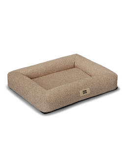 Zbliżenie na miękki materiał legowiska BUBBLE, który charakteryzuje się delikatną, przyjemną w dotyku strukturą, zapewniającą wygodę i ciepło dla psa.