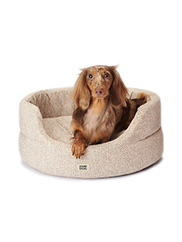 Zdjęcie owalnego legowiska BUBBLE marki John Dog z wyciągniętą poduchą. Kolor beżowy, wyraźnie pokazujący funkcjonalność wyciąganej poduchy oraz szczegóły wykonania wnętrza legowiska.