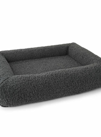Miękkie, ciemnoszare legowisko w prostokątnym kształcie model BALI Wooly od John Dog, zapewniające wygodę i przytulność. Grube, wyściełane boki oraz przestronne wnętrze idealnie dopasowane do relaksu pupila.