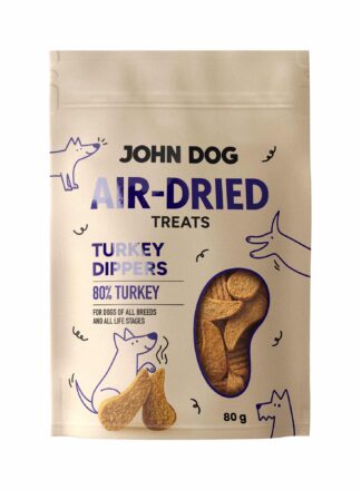 Przód opakowania suszonych przysmaków John Dog Air-Dried Turkey Dippers. Widoczna nazwa produktu, ilustracja psa oraz widok przysmaków w środku.