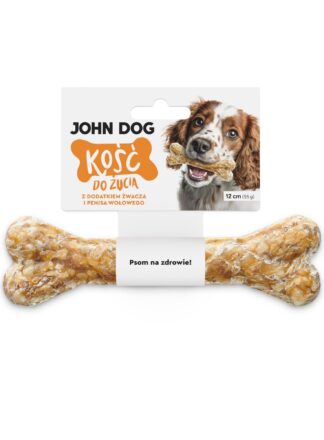 Kość do żucia 12 cm z dodatkiem żwacza i penisa wołowego w kolorze beżowym– widok od przodu. Na środku kości znajduje się biała owijka, do której przymocowana jest biała etykieta z pomarańczowym napisem. Po prawej na etykiecie jest pies rasy seter, który trzyma kość w zębach.