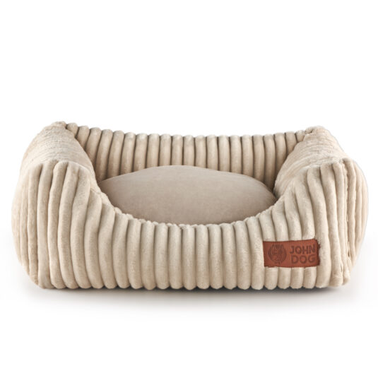 Beżowe legowisko – kanapa John Dog Black dla psa z wyciągniętą, łatwo czyszczącą się poduchą. Legowisko jest wykonane z polaru o strukturze sztruksu.