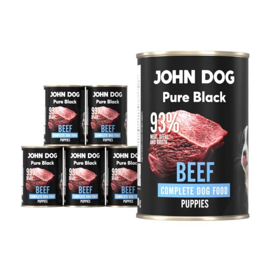 Karma mokra dla szczeniąt z wołowiny John Dog Pure Black w sześciu czarnych puszkach 400g. Na etykietach jest surowe mięso z wołowiny, zdjęcie psa oraz białe i niebieskie napisy.