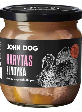 Mały słoik rarytasów John Dog z czarnym wieczkiem i czarną etykietą. Na etykiecie ilustracja indyka. W słoiku widać kawałki mięsa.