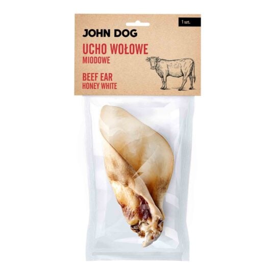Transparentne opakowanie gryzaka naturalnego dla psa marki John Dog z beżową etykietą, widok z przodu. Na etykiecie ilustracja krowy. W środku widoczne suszone ucho.